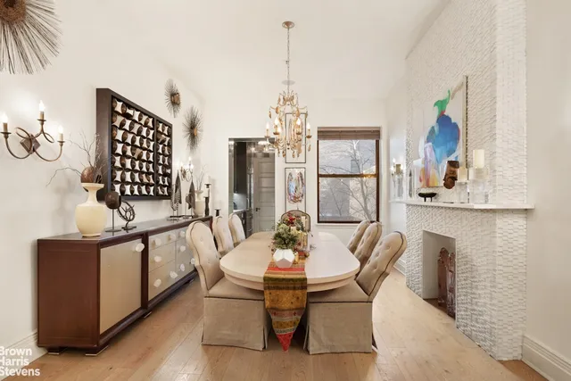 a living room with furniture and a stair