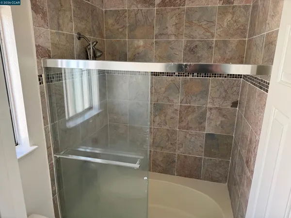 a view of a storage & utility room with a sink