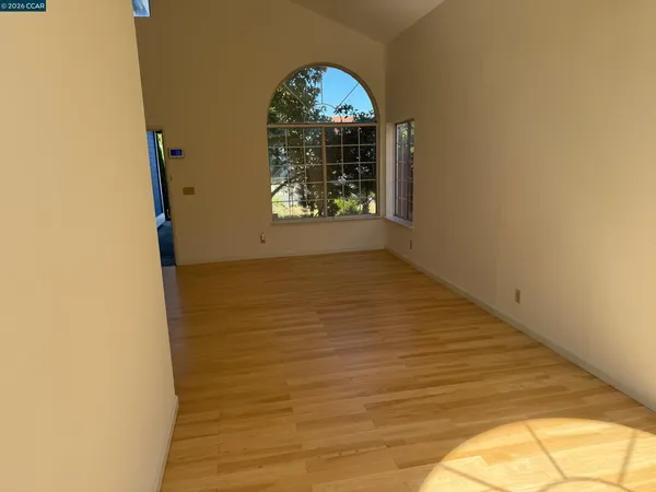 a view of a hardwood & staircase