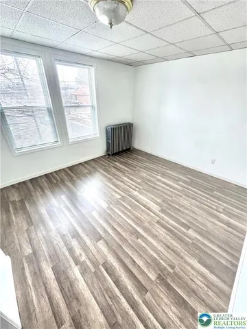 an empty room with windows