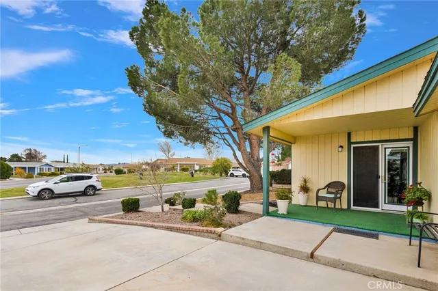 a view of an empty room with storage