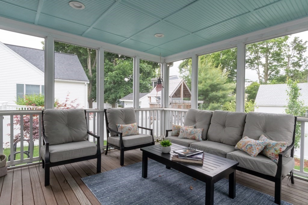 12 Longfellow Road Needham, MA 02494 - Photo 11 of 16 a living room with furniture and a large window