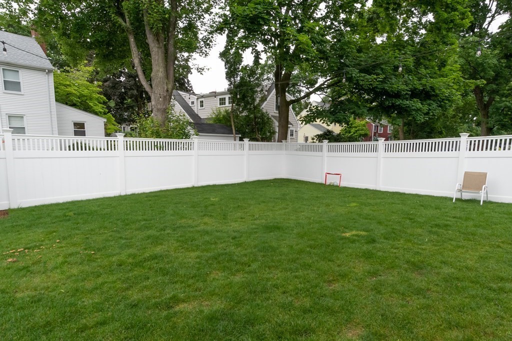 12 Longfellow Road Needham, MA 02494 - Photo 13 of 16 a view of green field with trees in the background