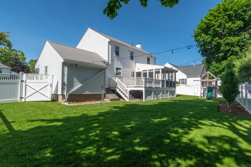 12 Longfellow Road Needham, MA 02494 - Photo 15 of 16 a view of a house with a yard and sitting area