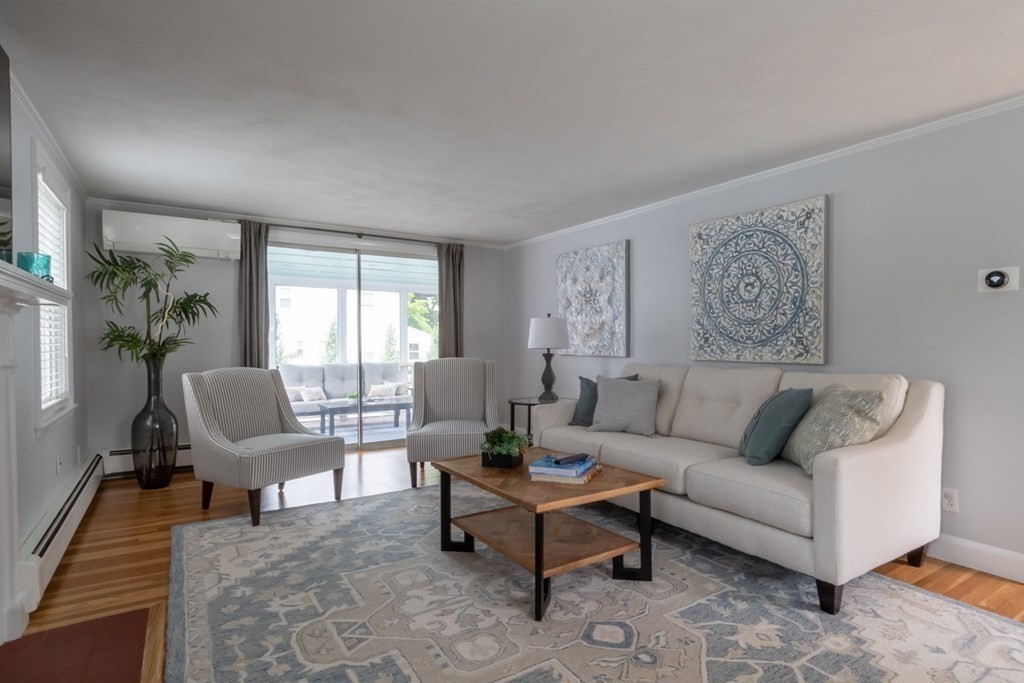 12 Longfellow Road Needham, MA 02494 - Photo 3 of 16 a living room with furniture and a large window