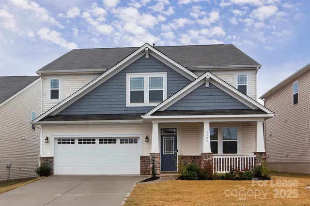 a front view of a house with yard
