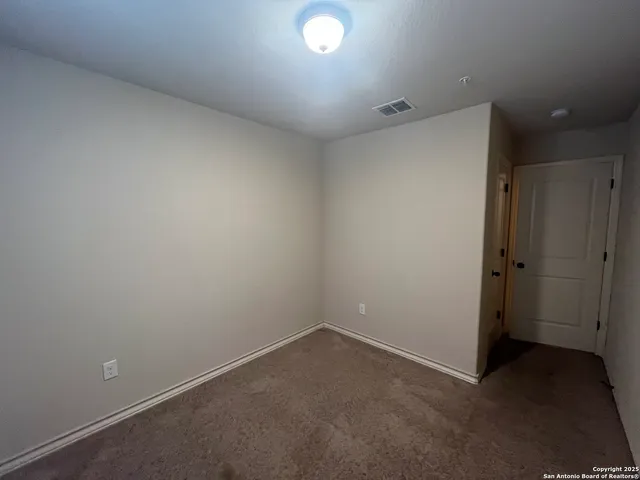 a bathroom with a bathtub and toilet