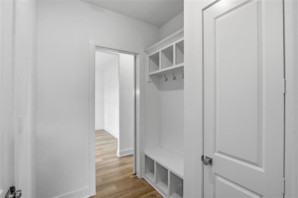 808 Vly Rdg Road Van Alstyne, TX 75495 - Photo 20 of 39 a view of hallway with wooden floor
