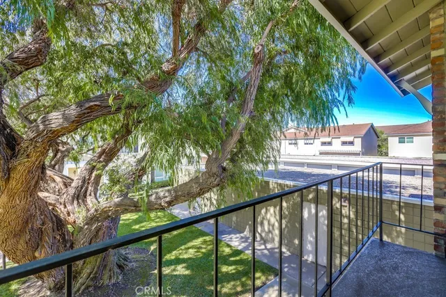 a view of a balcony with an outdoor space