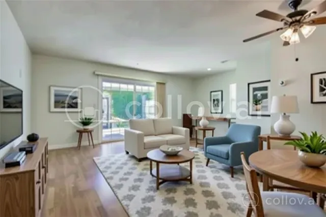 a living room with furniture potted plant and a window
