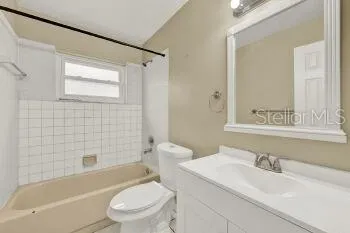 a bathroom with a sink a toilet and a bathtub