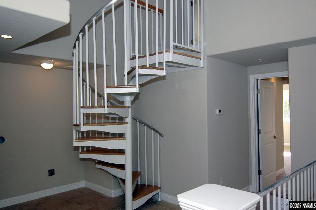 1990 Dickerson Road Reno, NV 89503 - Photo 3 of 9 a view of entryway with wooden floor and stairs
