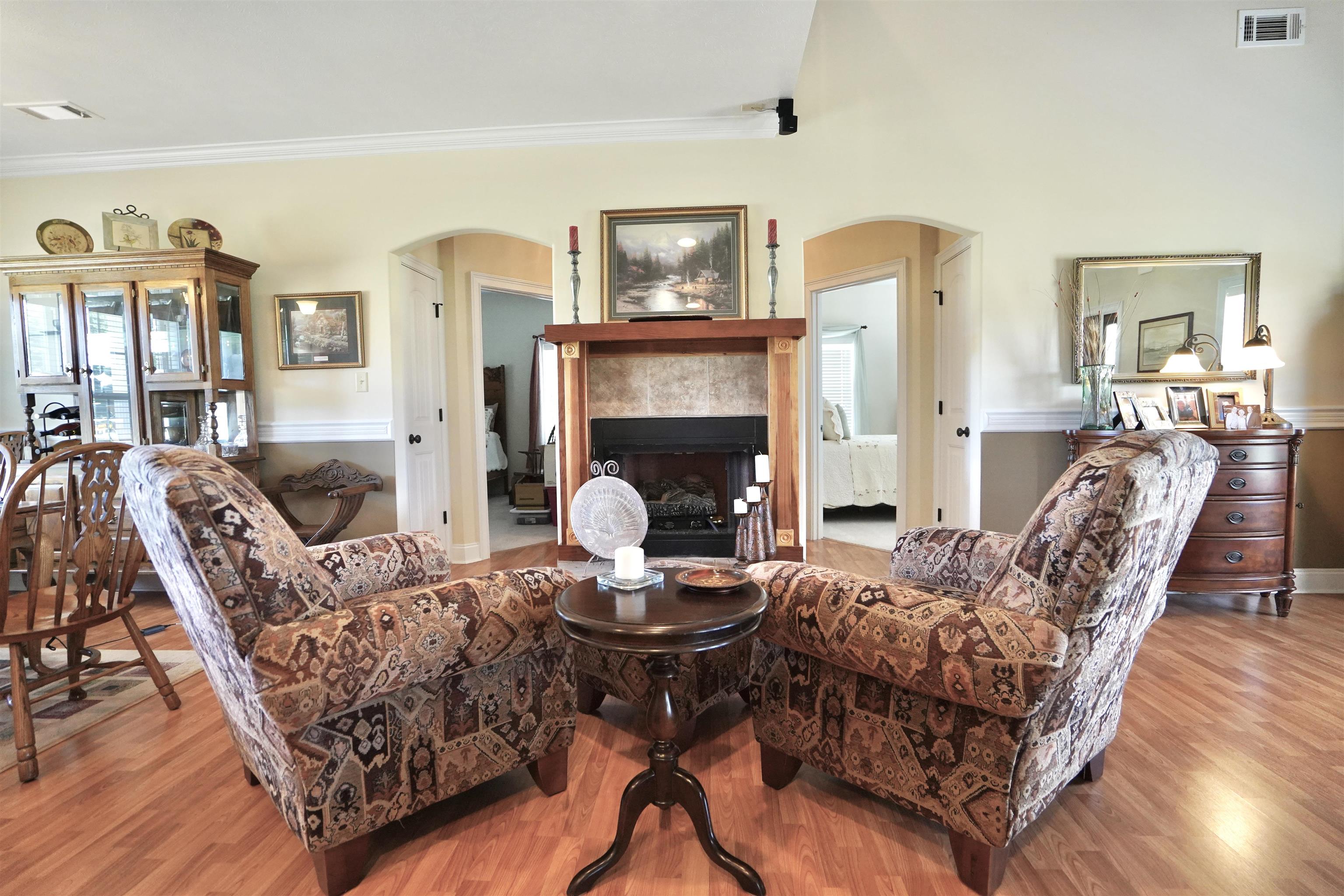 4556 Gainsville Road Mason, TN 38049 - Photo 18 of 33 Living room with ornamental molding and hardwood / wood-style flooring
