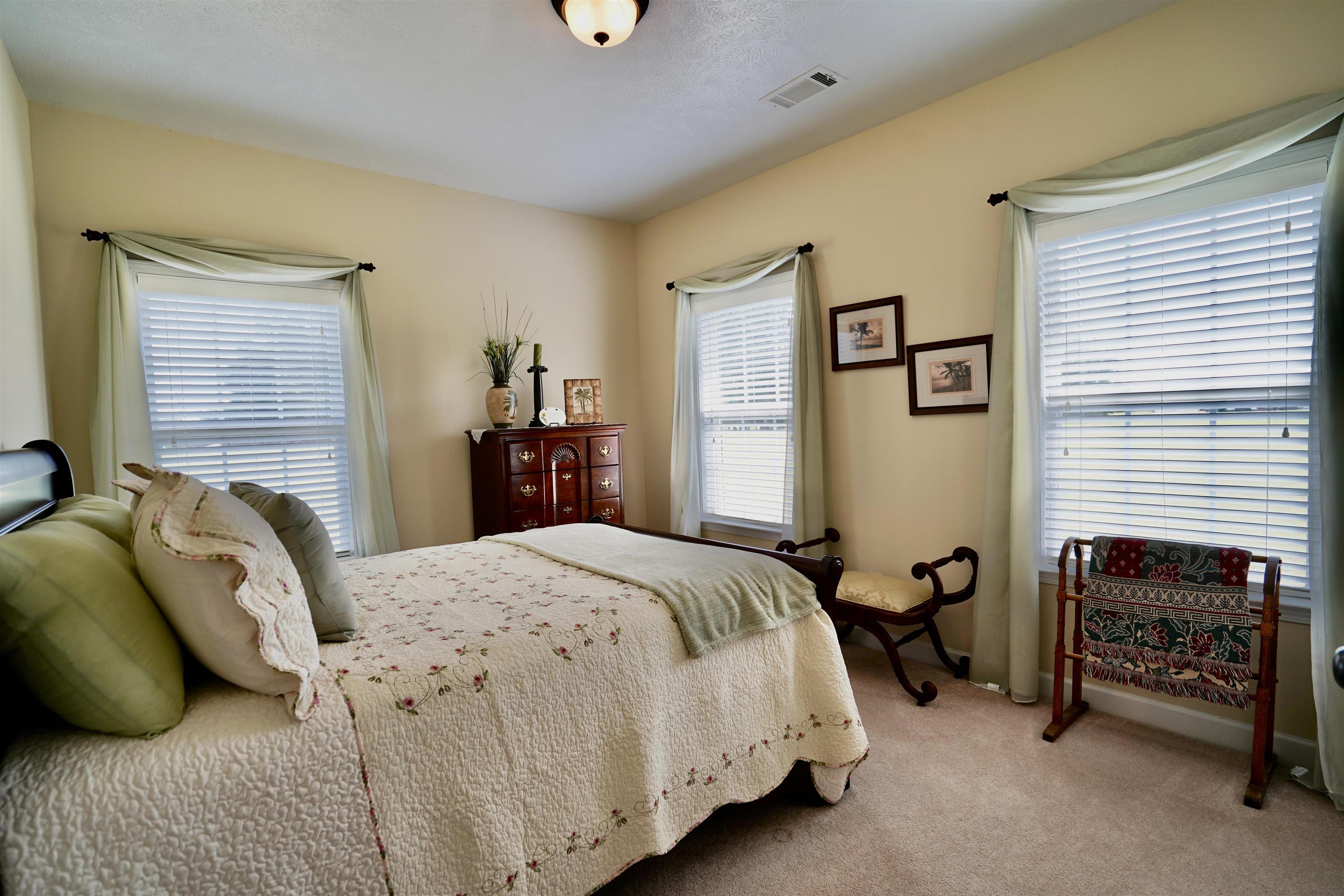 4556 Gainsville Road Mason, TN 38049 - Photo 26 of 33 Bedroom with carpet flooring