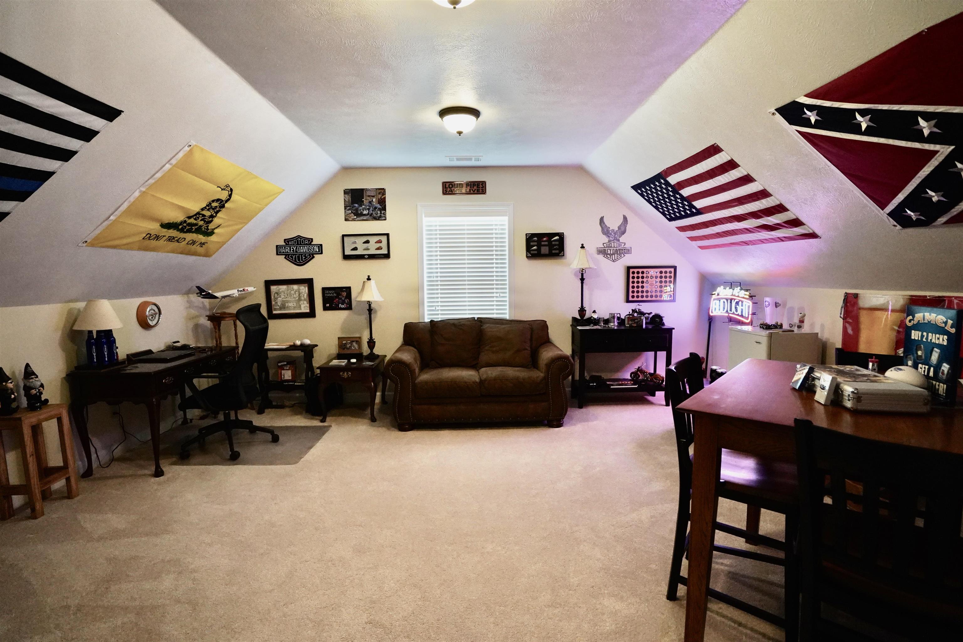 4556 Gainsville Road Mason, TN 38049 - Photo 33 of 33 Home office with a textured ceiling, lofted ceiling, and carpet