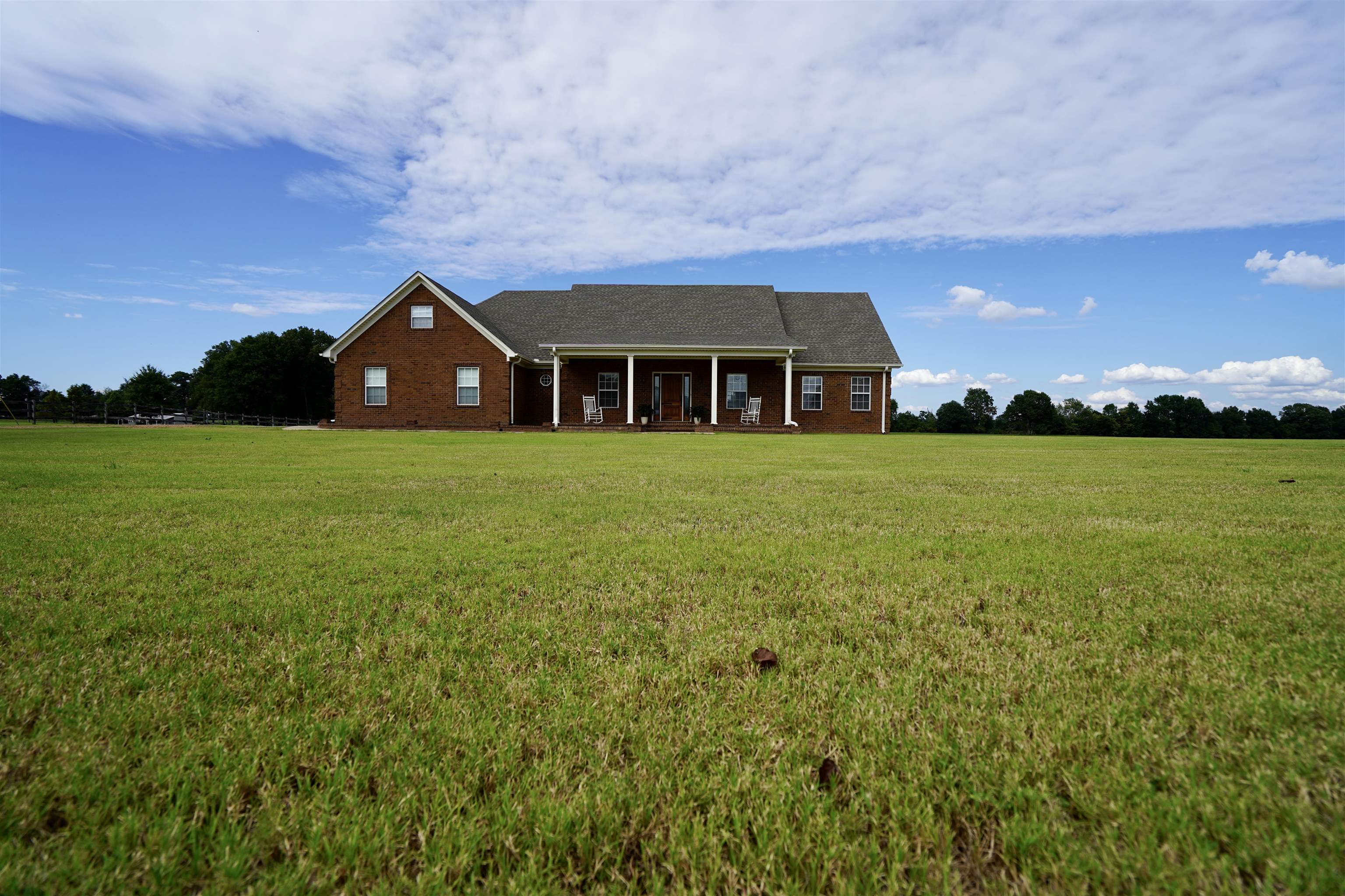 4556 Gainsville Road Mason, TN 38049 - Photo 4 of 33 Ranch-style home with a rural view and a front lawn