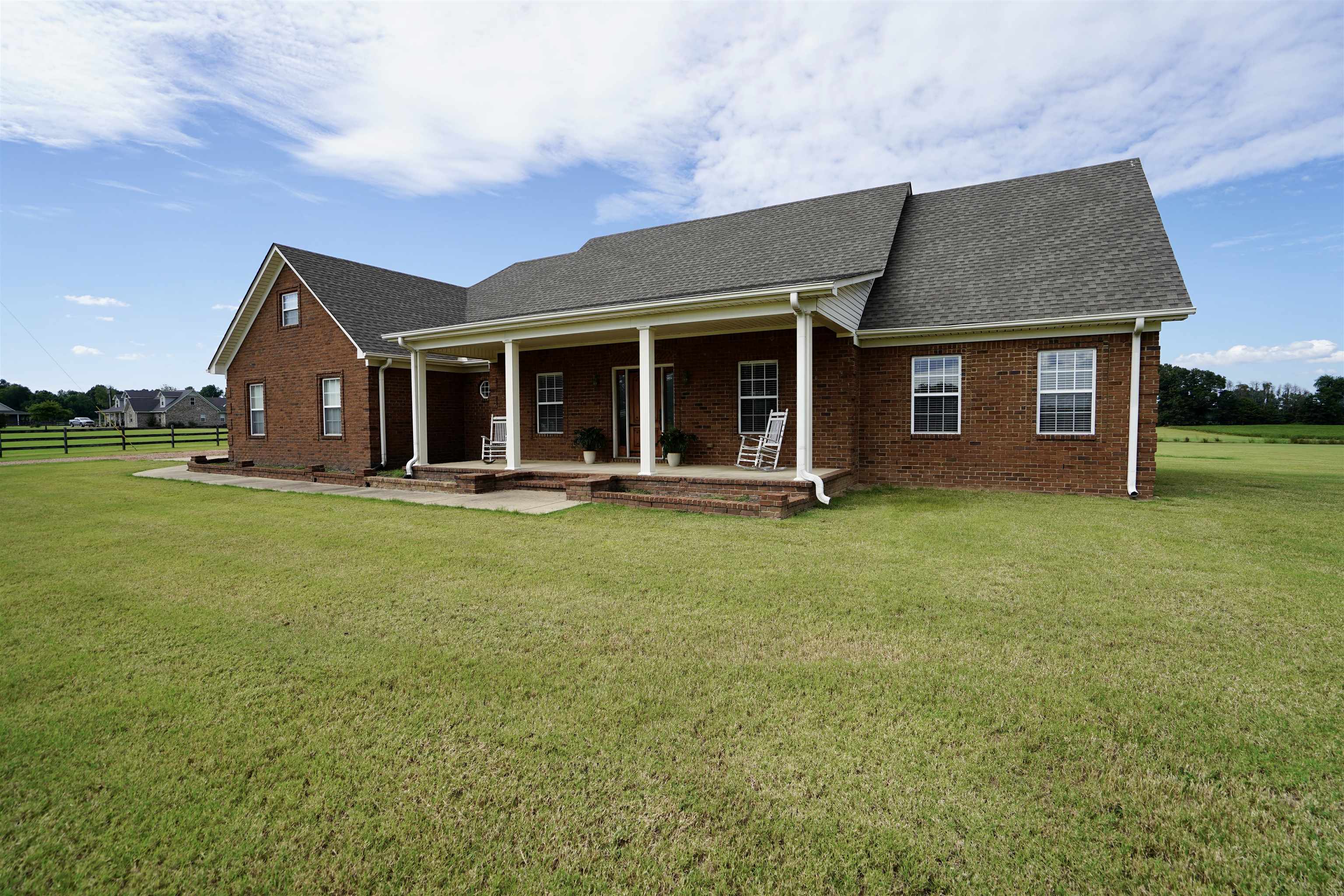 4556 Gainsville Road Mason, TN 38049 - Photo 5 of 33 Exterior space with a yard and covered porch