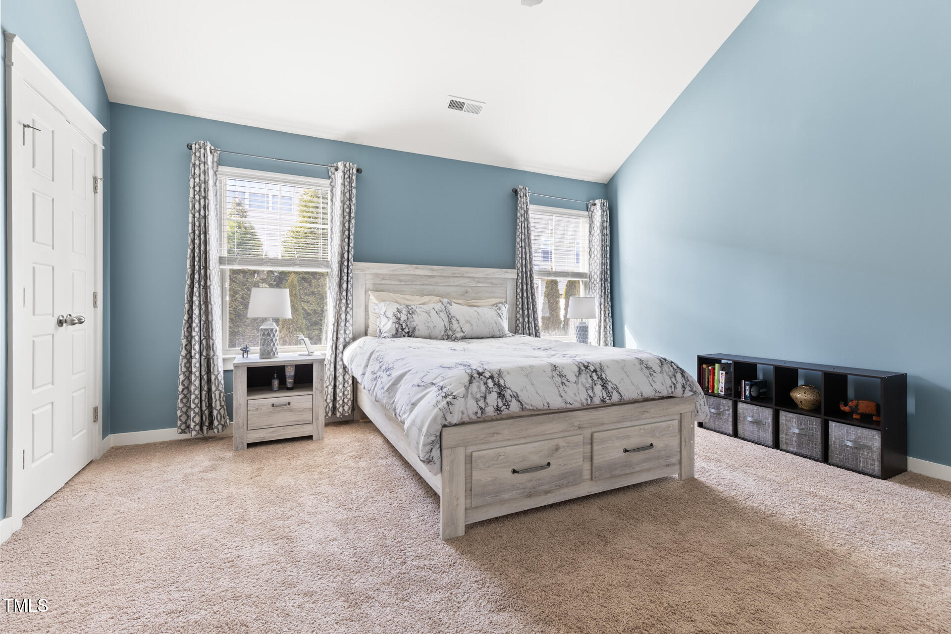 7832 Allscott Way Raleigh, NC 27612 - Photo 22 of 33 a bedroom with a bed rug and window