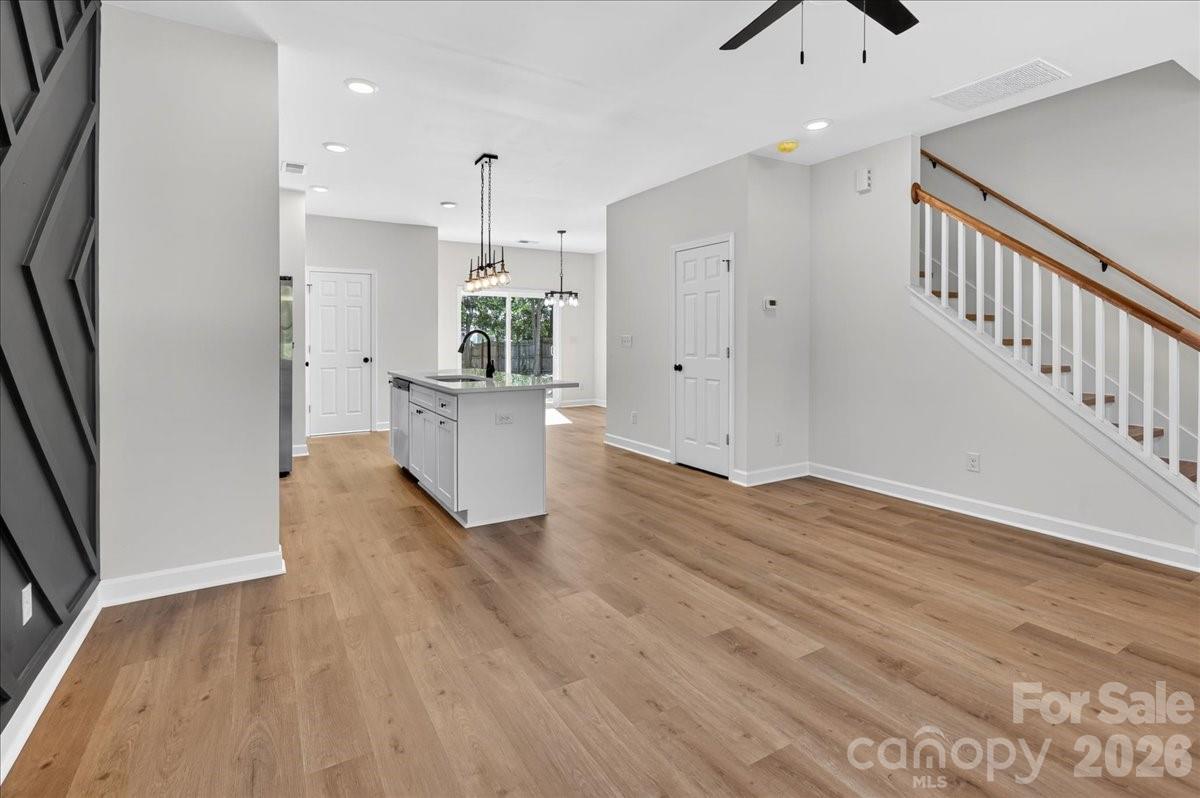 2108 Moose Road Kannapolis, NC 28081 - Photo 6 of 22 a view of a kitchen with wooden floor