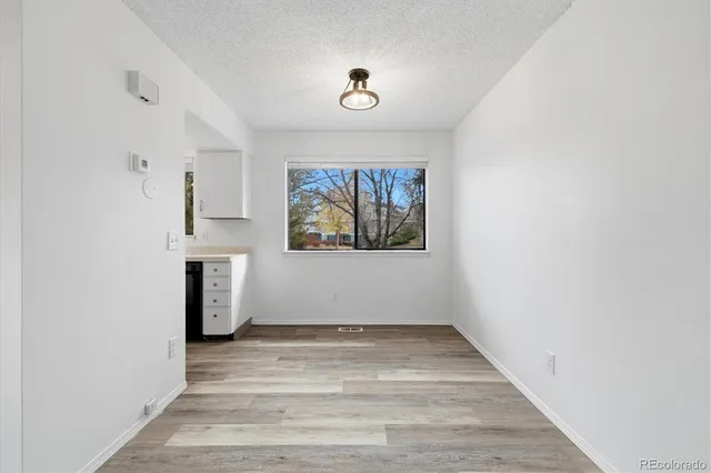 a view of empty room with a window