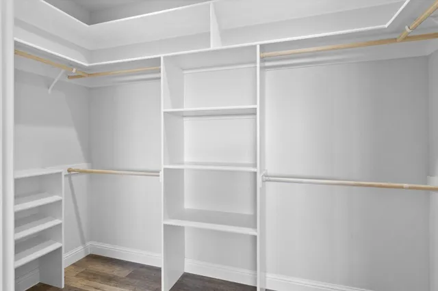 a view of an empty walk in closet