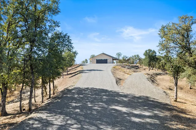 a front view of a house with a garage