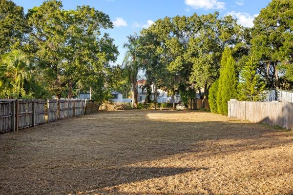 8715 Mayflower Road Tampa, FL 33615 - Photo 2 of 5 a view of road with trees
