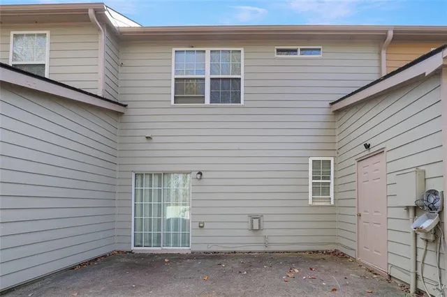 a view of a house with a yard and garage