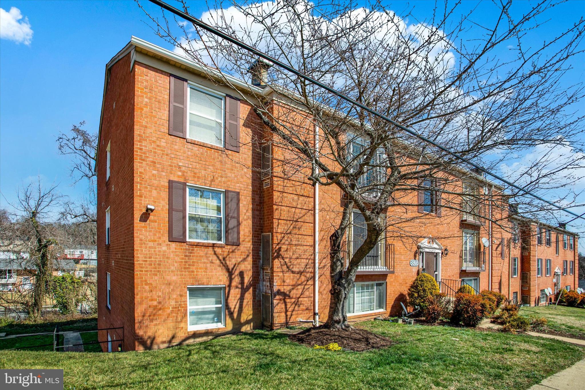 3805 Swann Road, Unit 304 Suitland, MD 20746 - Photo 16 of 16 front view of house with a yard