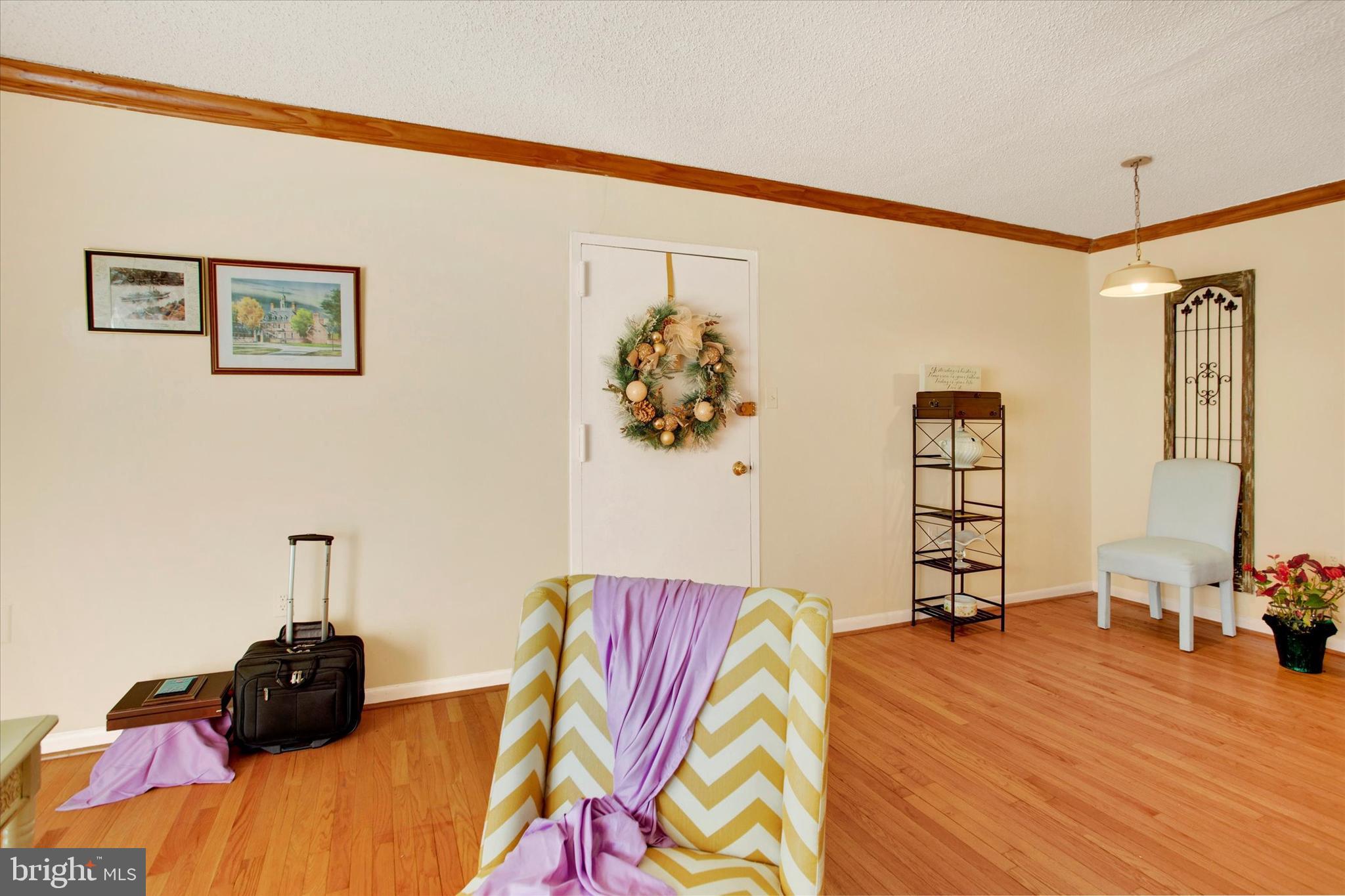 3805 Swann Road, Unit 304 Suitland, MD 20746 - Photo 4 of 16 a bedroom with a bed and a closet