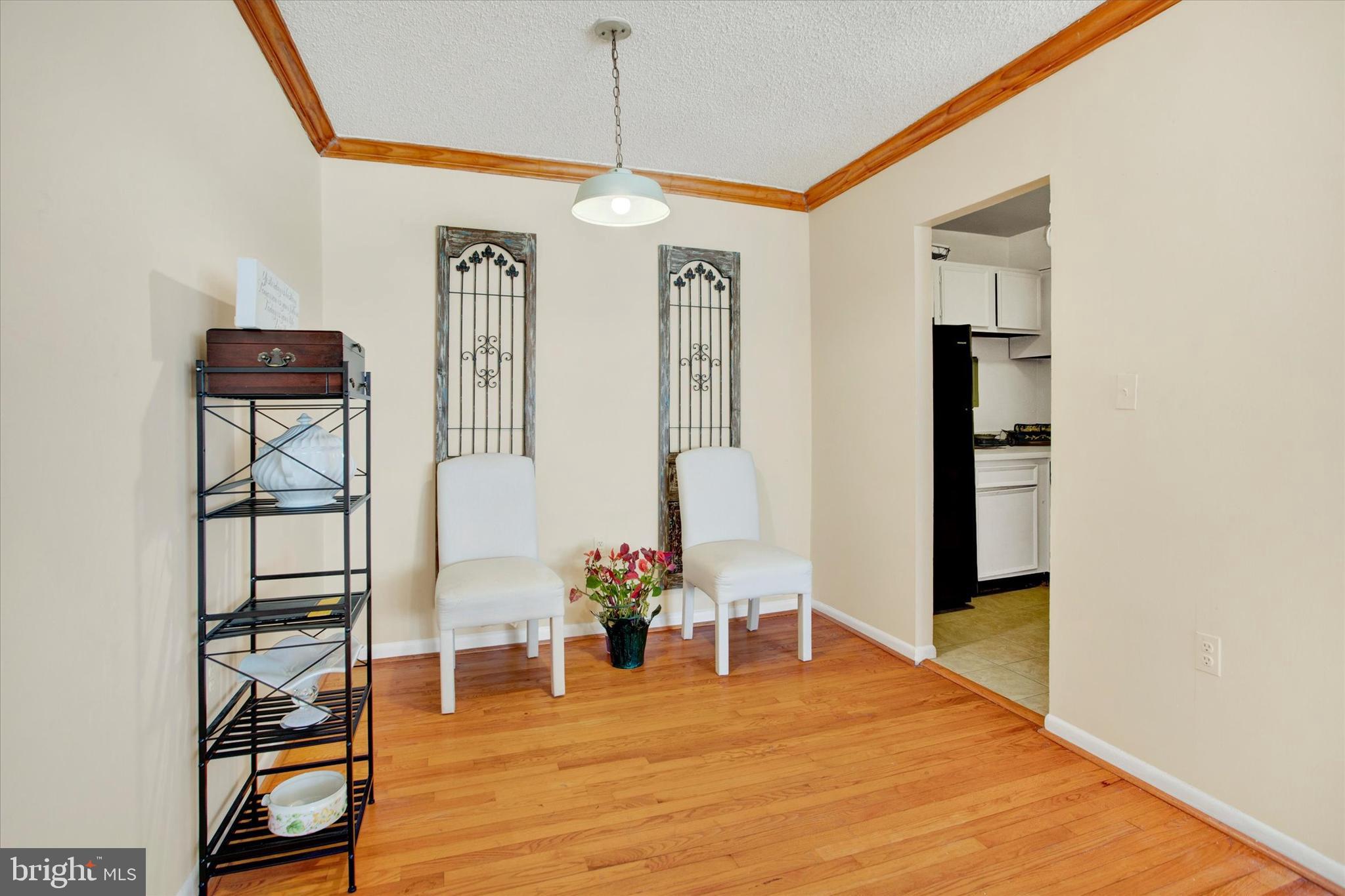 3805 Swann Road, Unit 304 Suitland, MD 20746 - Photo 5 of 16 a view of livingroom with furniture and workspace