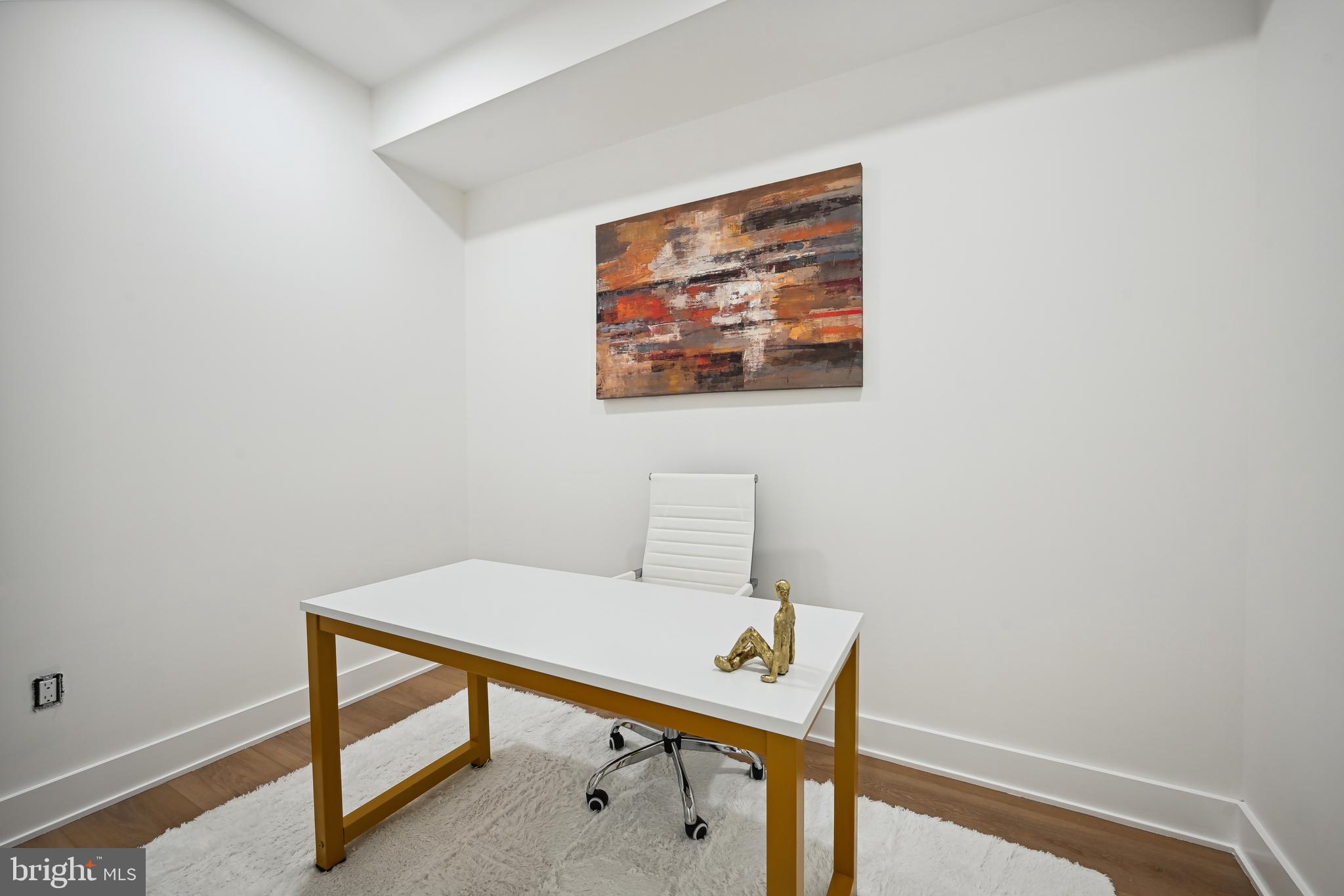 1372 Bryant Street Northeast, Unit 2 Washington, DC 20018 - Photo 15 of 22 a view of a workspace with furniture