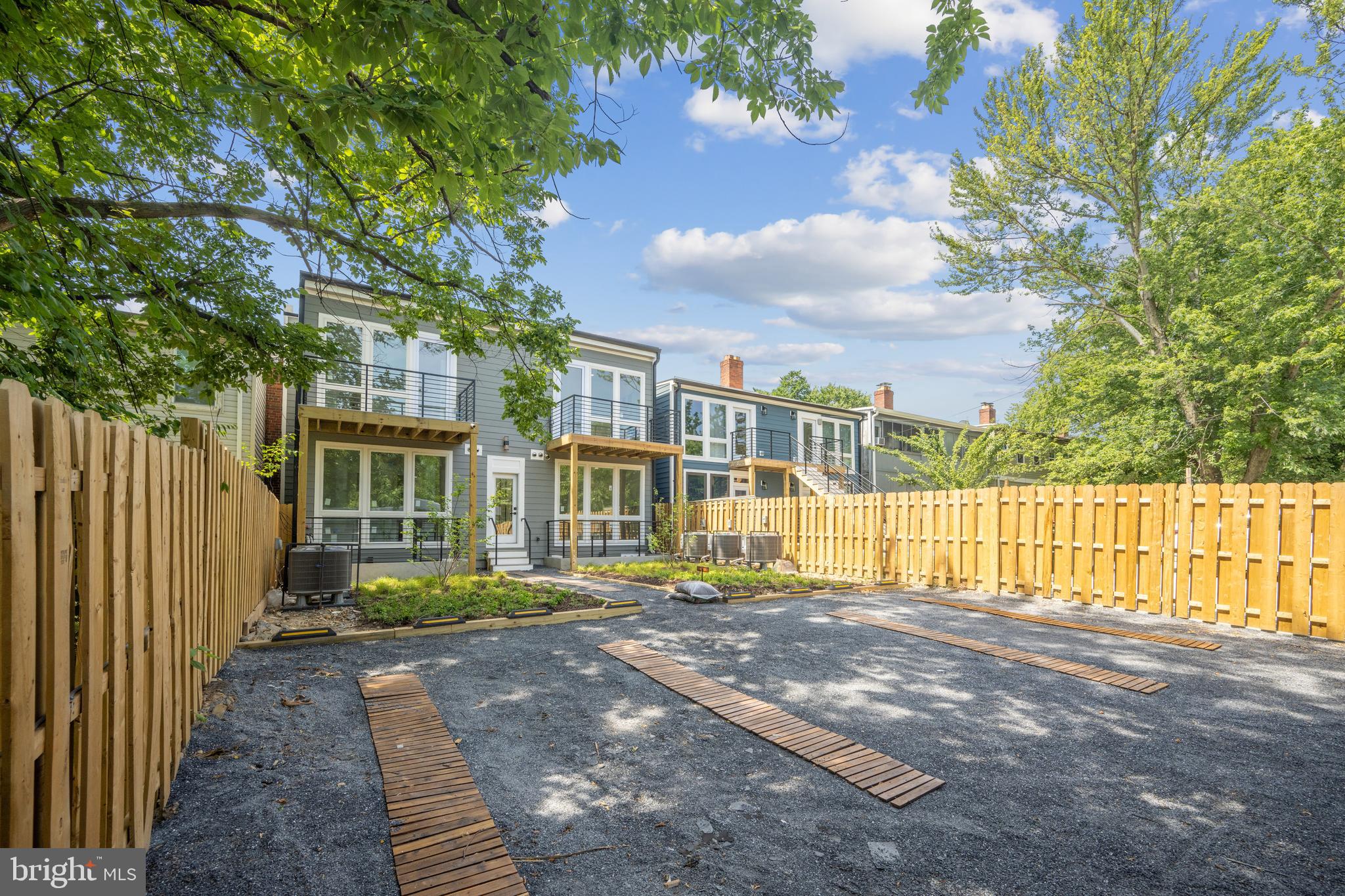 1372 Bryant Street Northeast, Unit 2 Washington, DC 20018 - Photo 22 of 22 a view of a house with a garden