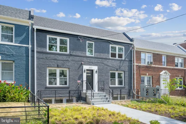 a front view of house with a yard