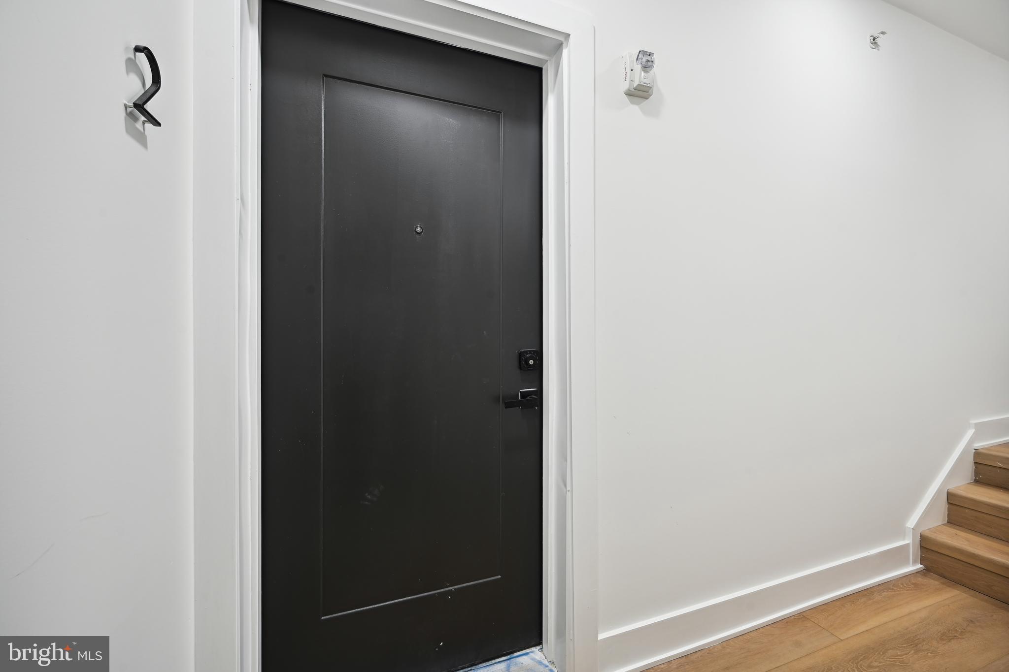 1372 Bryant Street Northeast, Unit 2 Washington, DC 20018 - Photo 4 of 22 a view of a hallway