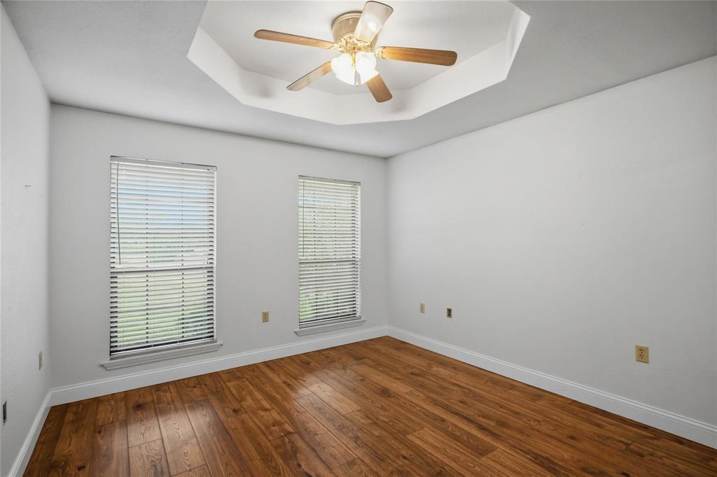 265 East Dove Road Southlake, TX 76092 - Photo 28 of 39 wooden floor in an empty room with a window