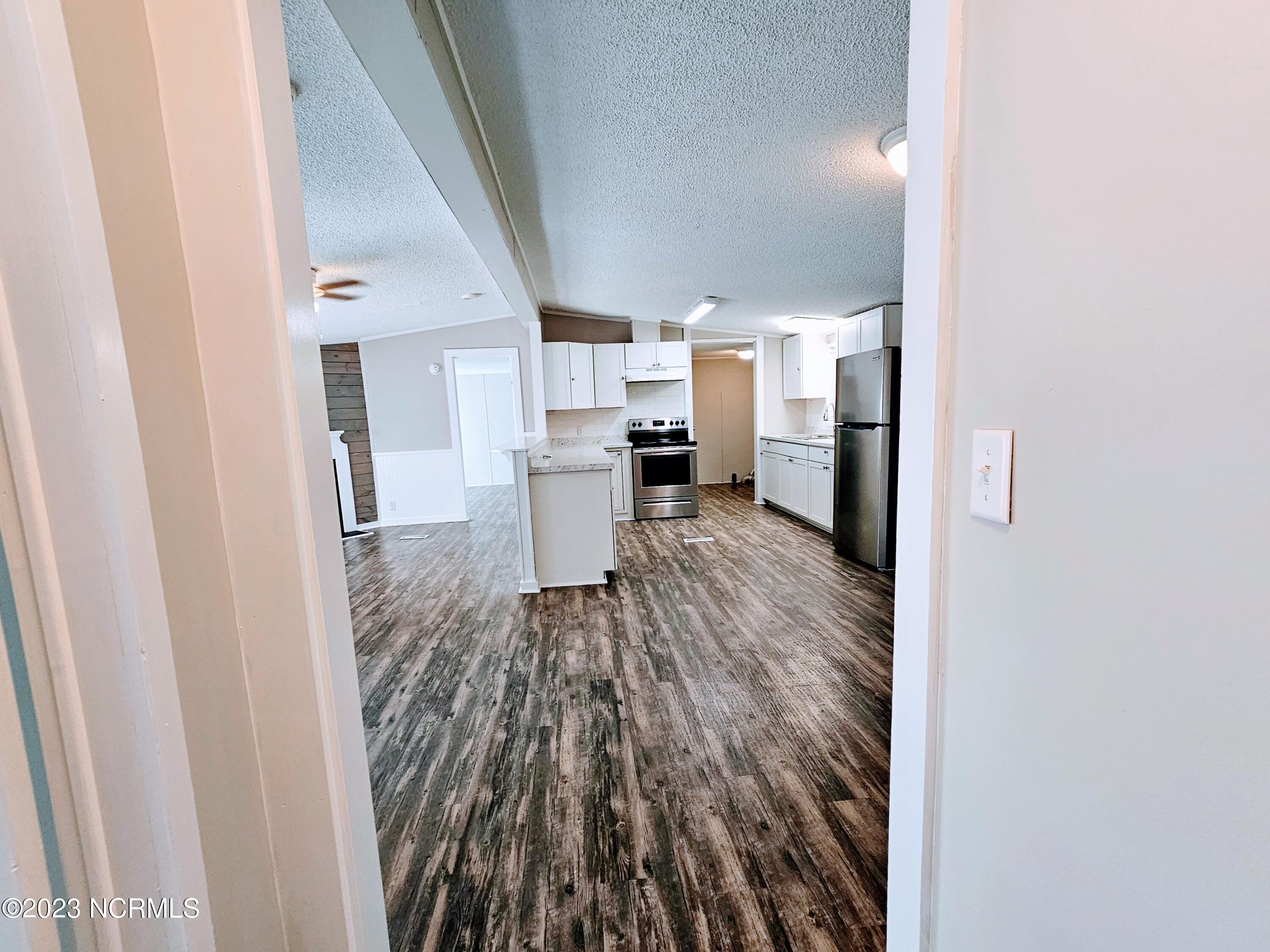 4609 Cove Road Wilmington, NC 28405 - Photo 6 of 31 20230827_104946
