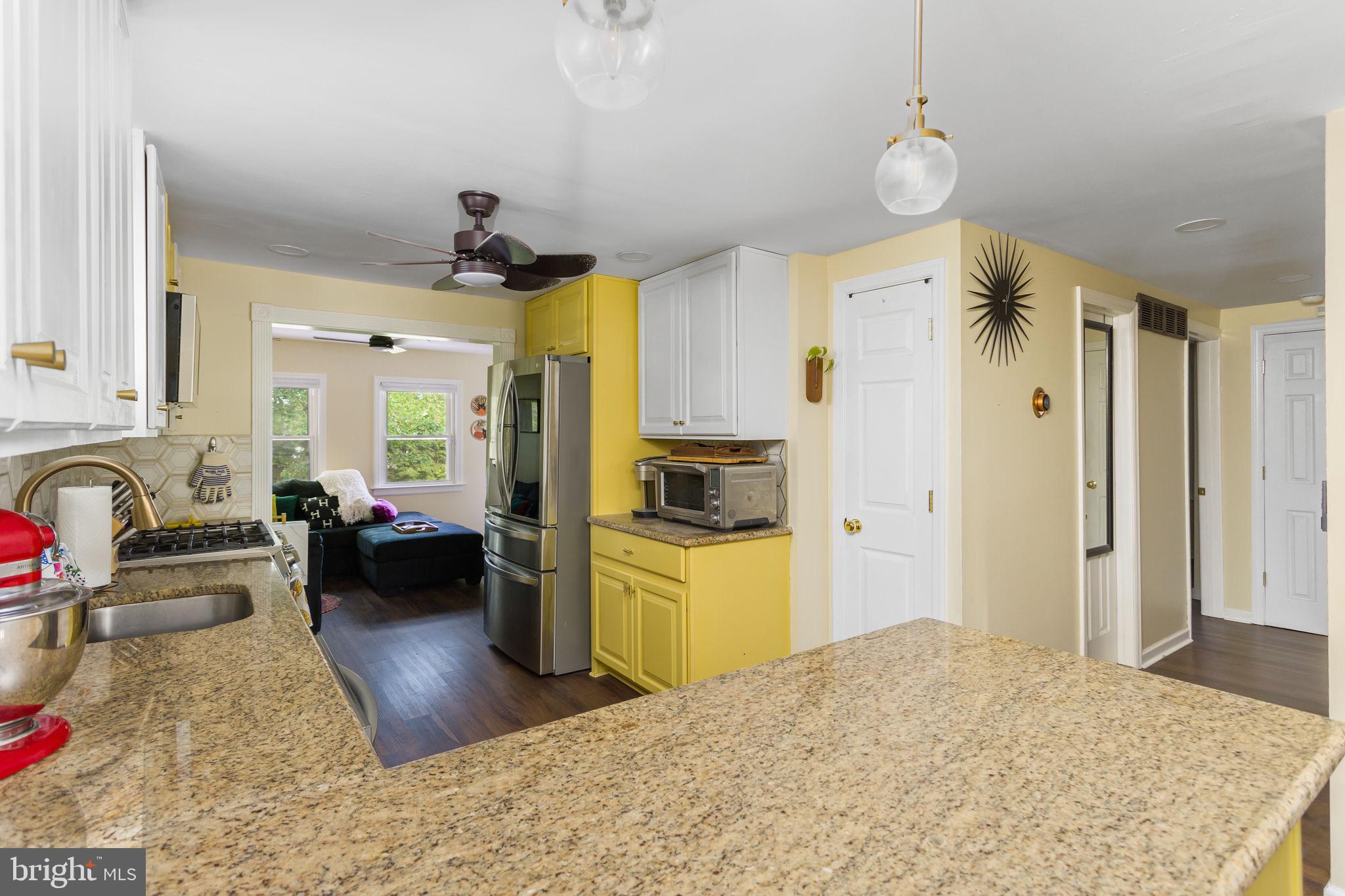 227 Princeton Avenue Hamilton, NJ 08619 - Photo 11 of 41 a bedroom with a bed and a couch