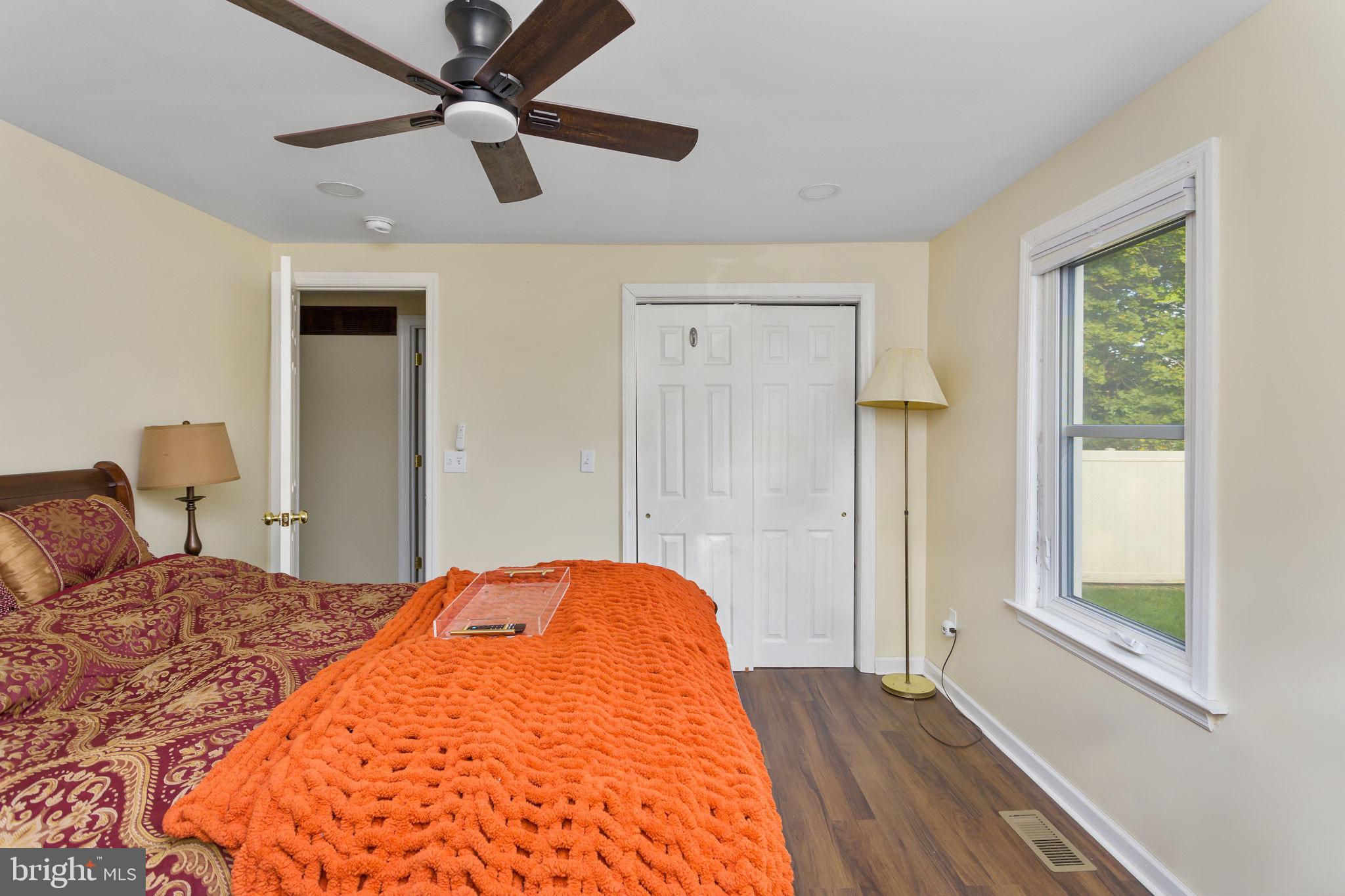 227 Princeton Avenue Hamilton, NJ 08619 - Photo 16 of 41 a bedroom with a bed and a window