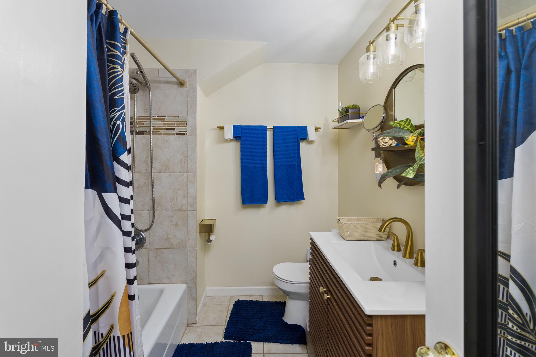 227 Princeton Avenue Hamilton, NJ 08619 - Photo 18 of 41 a bathroom with a bathtub and shower