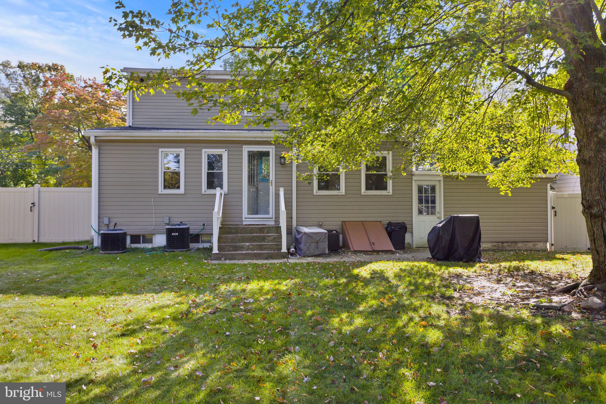 227 Princeton Avenue Hamilton, NJ 08619 - Photo 32 of 41 a view of a house with a yard and a tree
