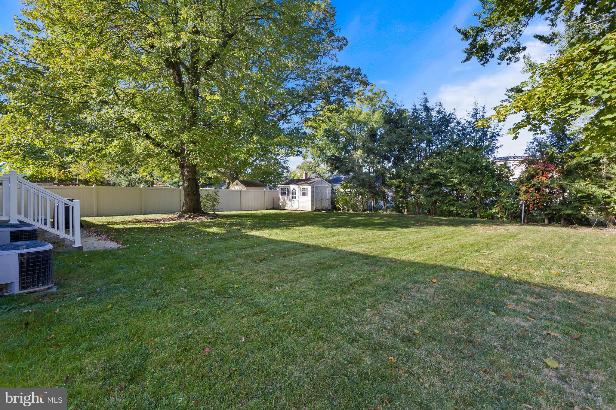 227 Princeton Avenue Hamilton, NJ 08619 - Photo 34 of 41 a view of outdoor space with deck and trees