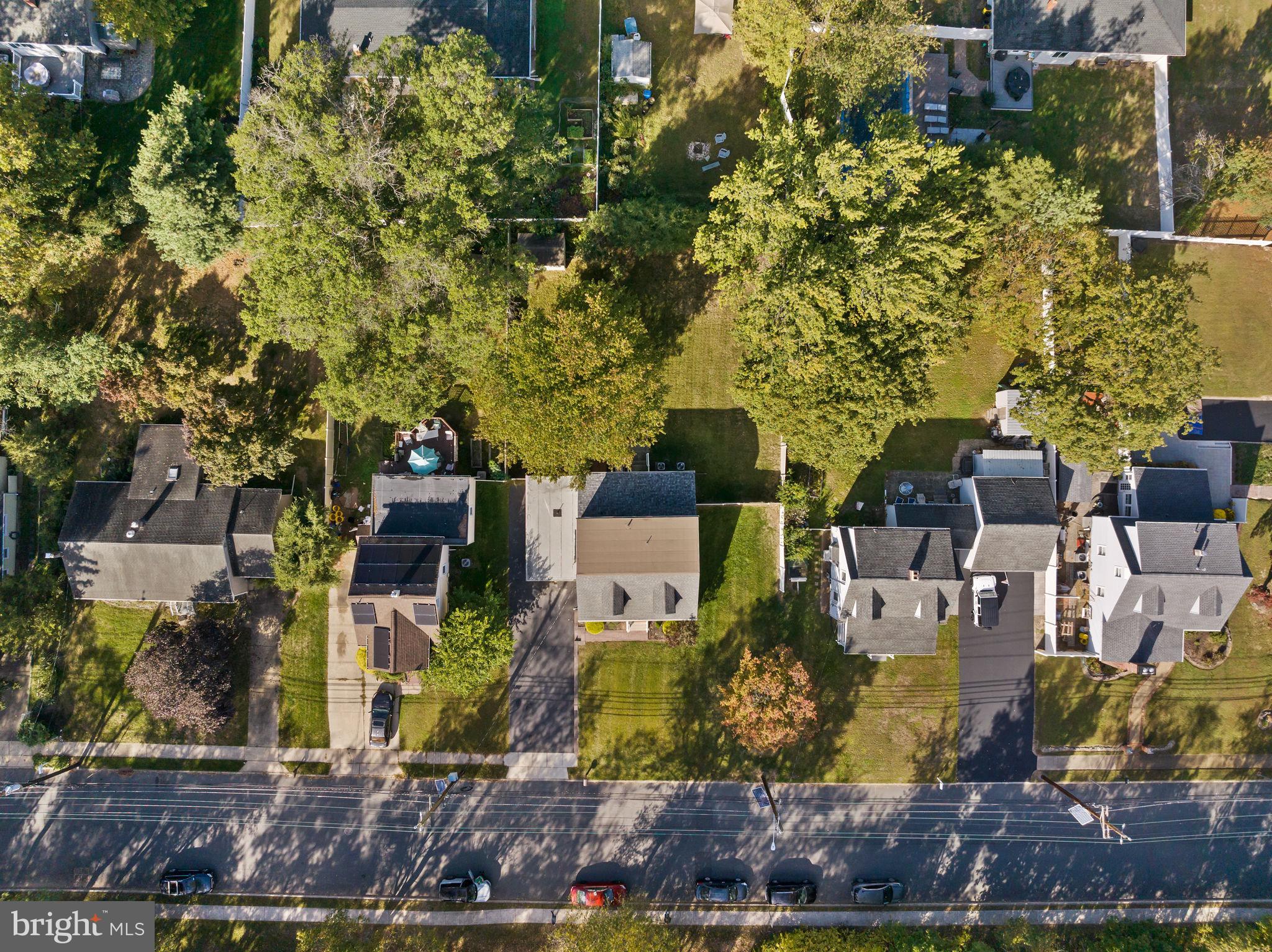 227 Princeton Avenue Hamilton, NJ 08619 - Photo 36 of 41 an aerial view of a house with a yard large trees