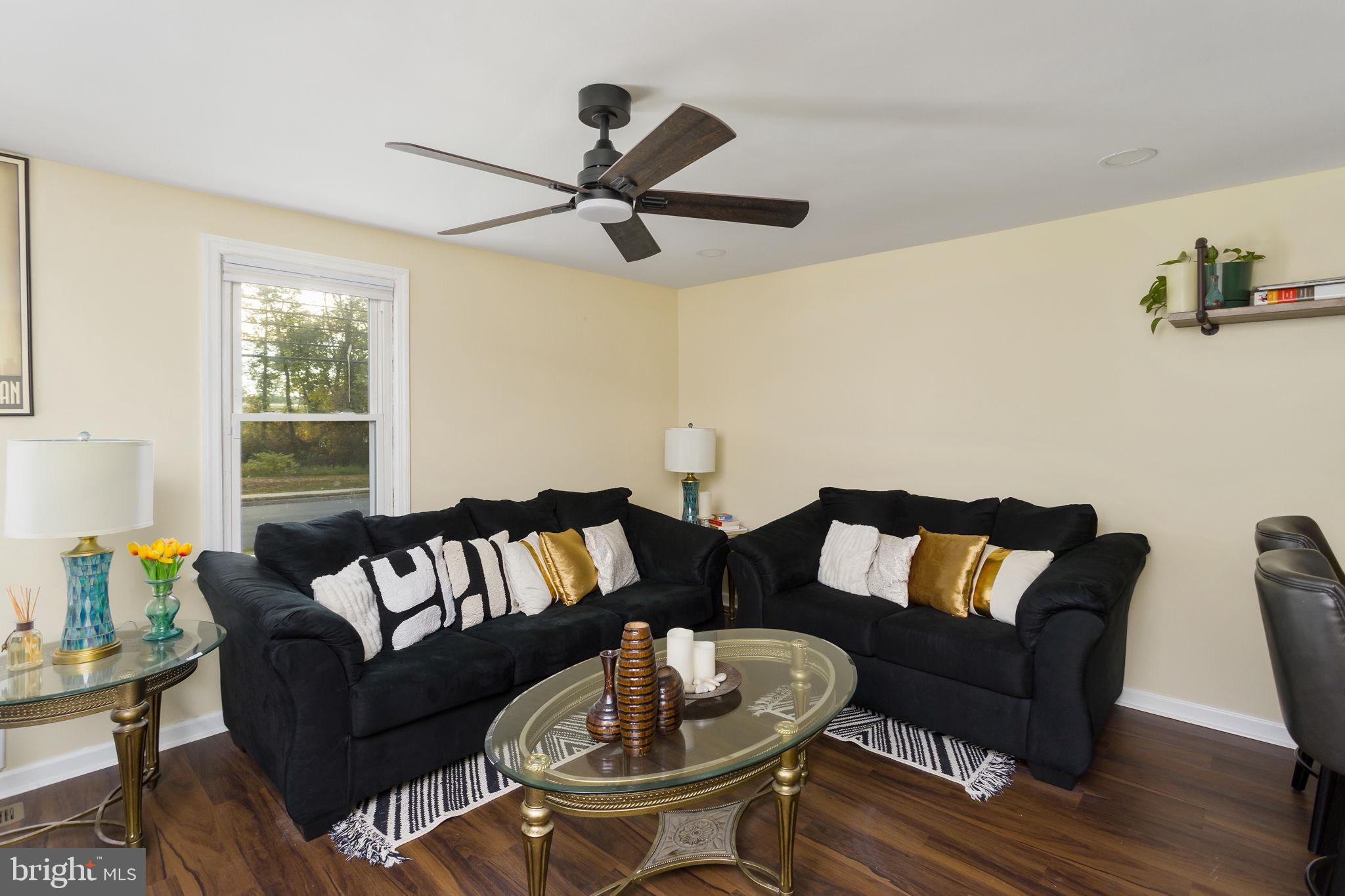 227 Princeton Avenue Hamilton, NJ 08619 - Photo 5 of 41 a living room with furniture and a large window