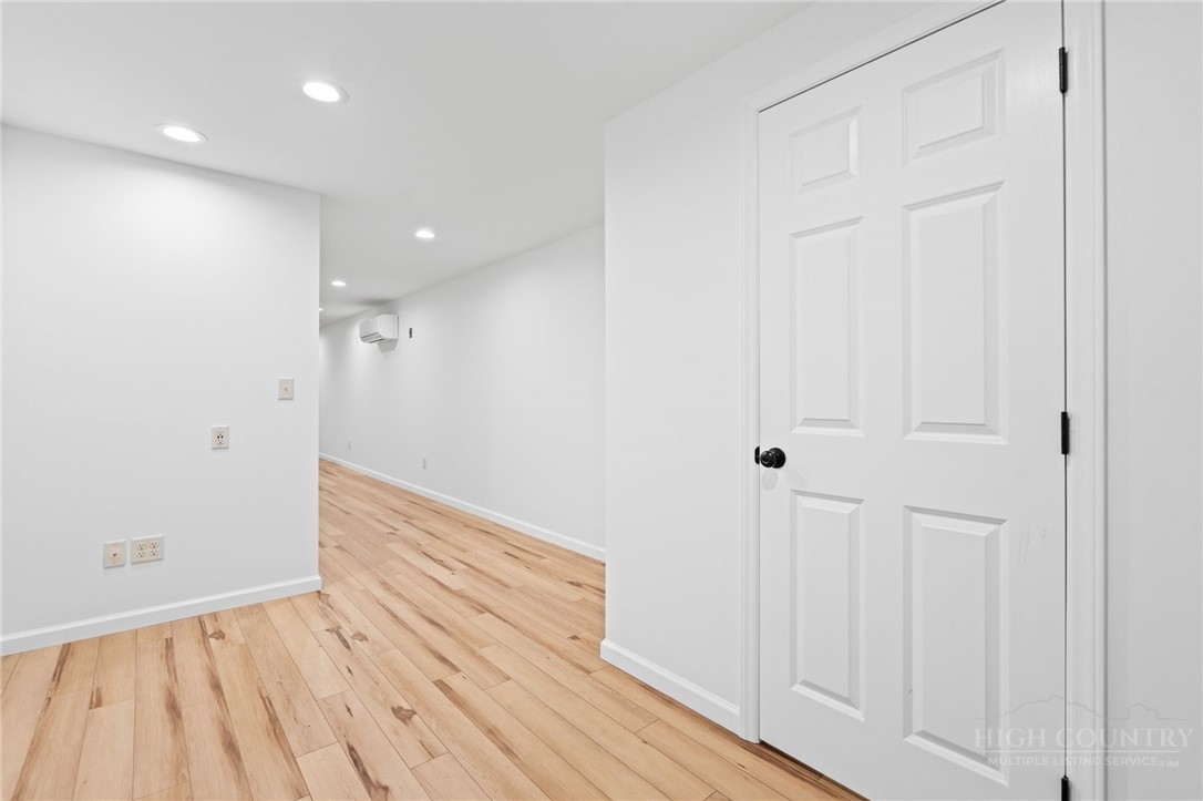 480 North Ridge Circle Boone, NC 28607 - Photo 30 of 50 a view of a hallway with wooden floor