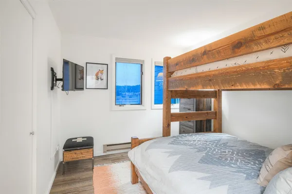 a view of houses with a yard