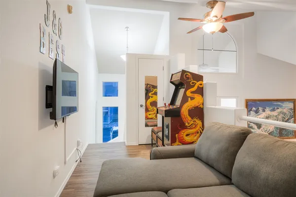 a view of a swimming pool with a patio and a yard