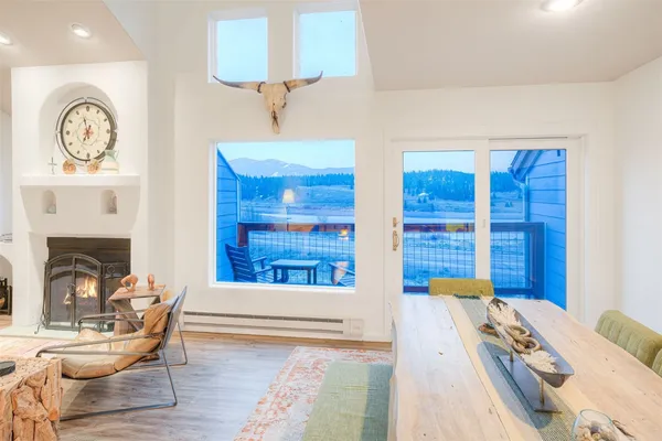 a spacious bedroom with a bed and a window