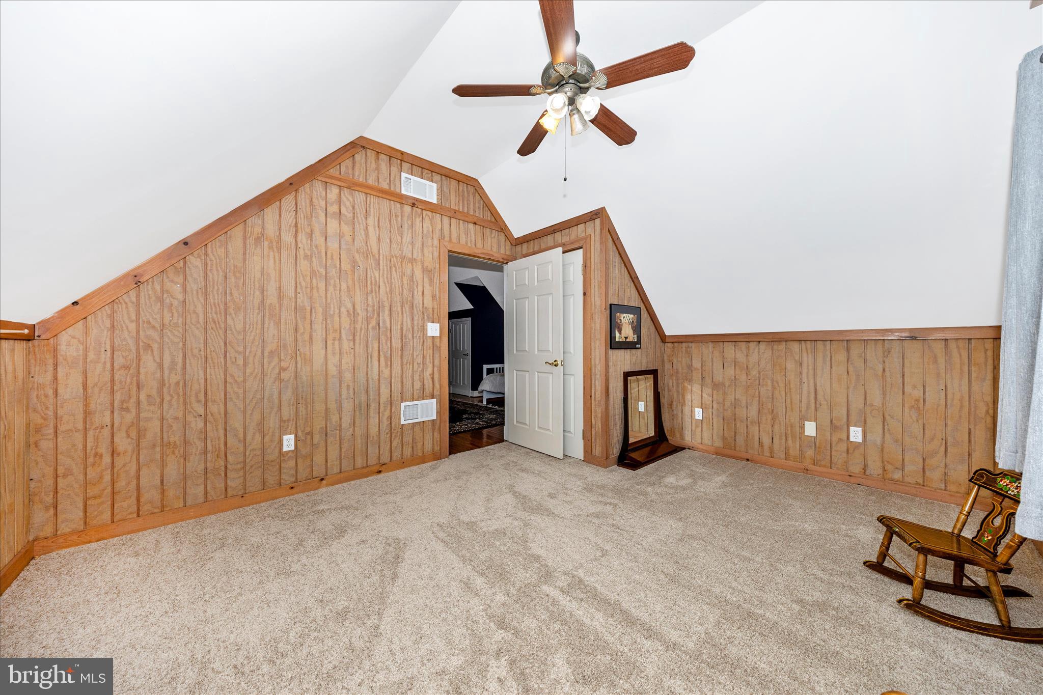 15810 Spade Road Hagerstown, MD 21740 - Photo 25 of 76 a view of a livingroom with a ceiling fan and staircase