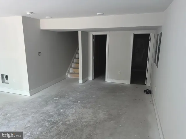 a bathroom with a tub and sink